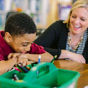 A teacher with one of her students